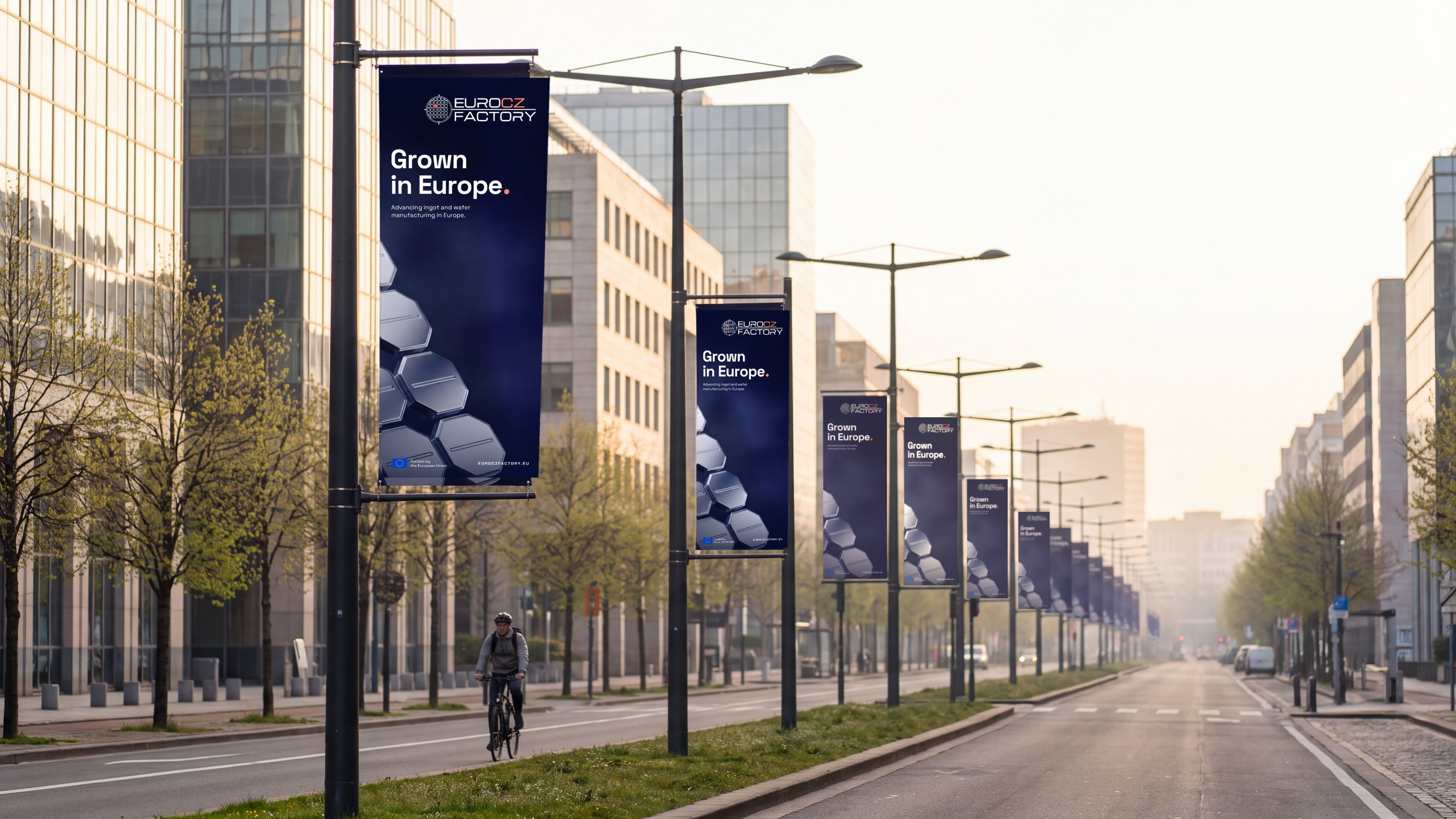 Grown in Europe banners on lamp posts along a city boulevard.