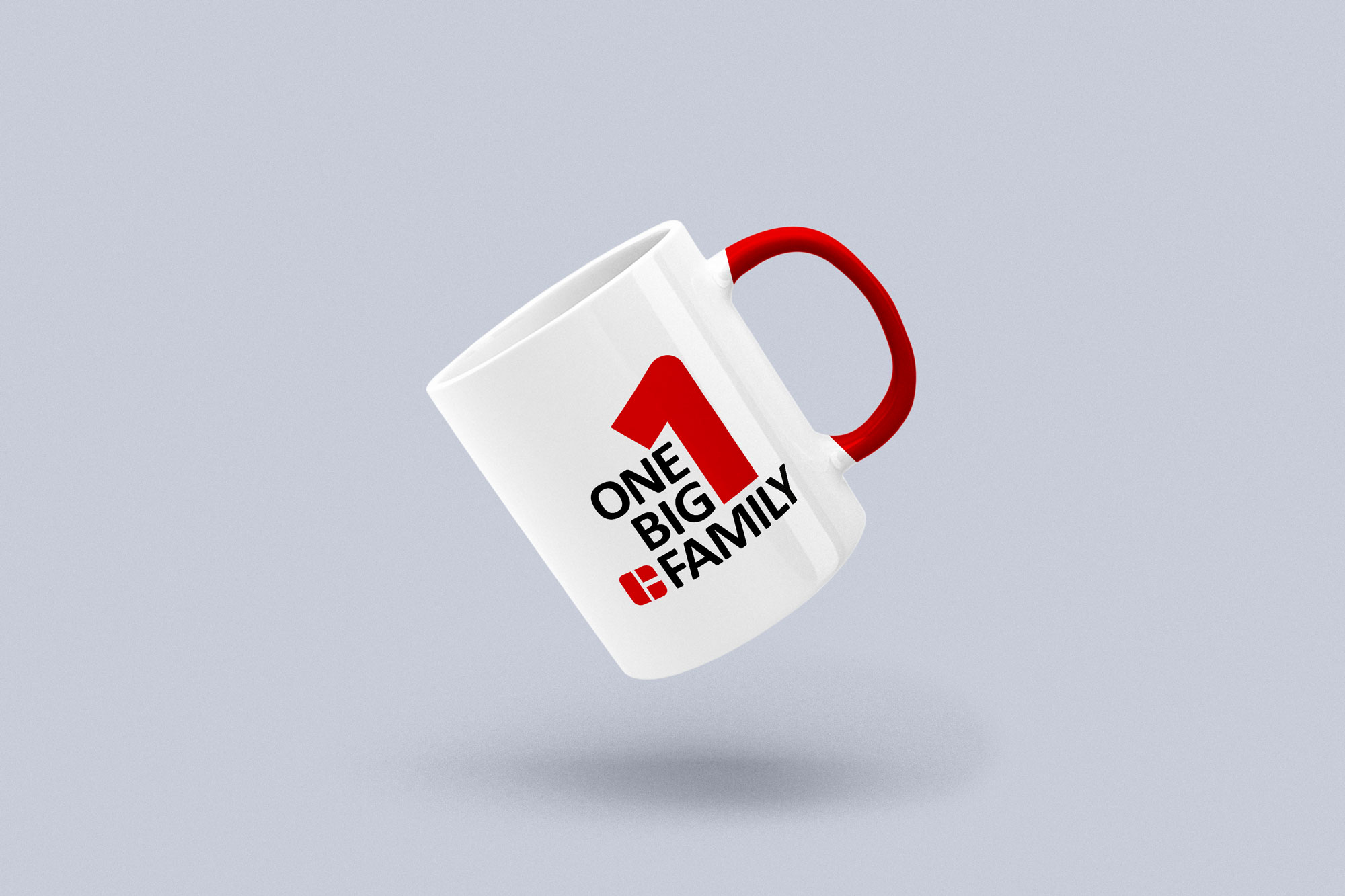 Cordeel One Big Family branded mug with red handle